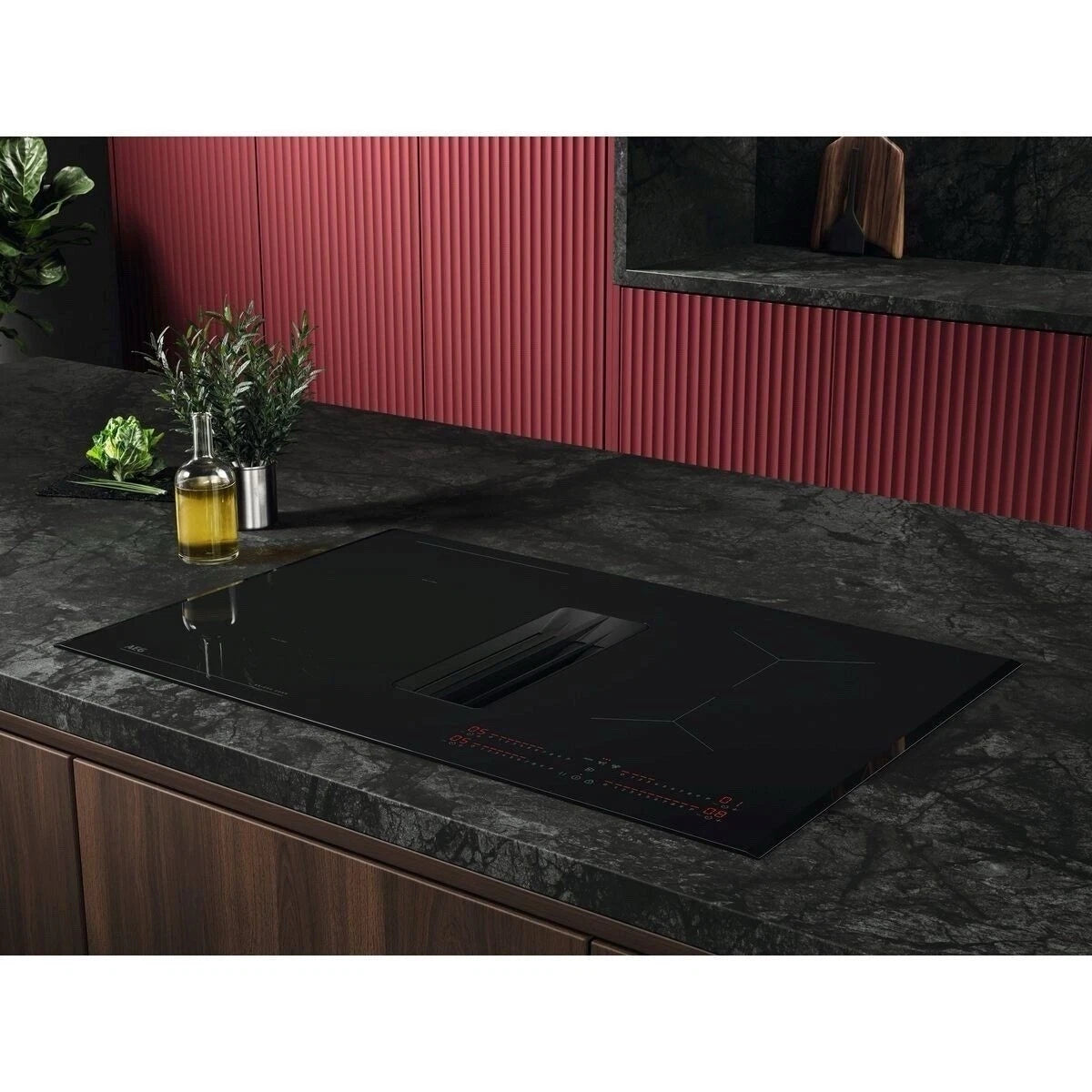 AEG Series 6000 TH84CB03FB 81cm Induction Hob with Venting Extraction in Black - A+ Rated - HW181702-03 from HomeWise Appliances. Stock Photo showing hob fitted in a kitchen worktop.